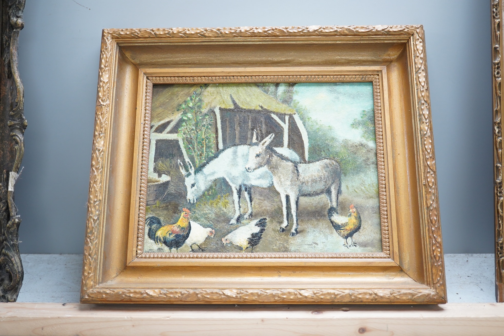 After Edgar Hunt (1876-1953), oil on canvas, Donkeys and poultry before farmland, unsigned, Windsor & Newton stamp to canvas verso, 16 x 21cm. Condition - good